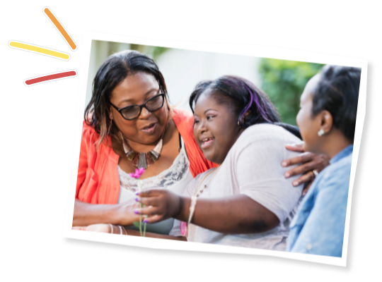 Une famille assise ensemble dehors